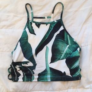 Crop top with leaves. Open sides. Never worn.